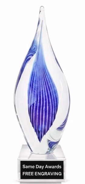 Blue Pinnacle hand blown art glass recognition award with blue swirl design and clear glass base