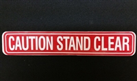 "Caution Stand Clear" - â€‹1 5/8"H x 9"W - (One Sided) - â€‹ANSI 156.10 COMPLIANT - (NABCO)
