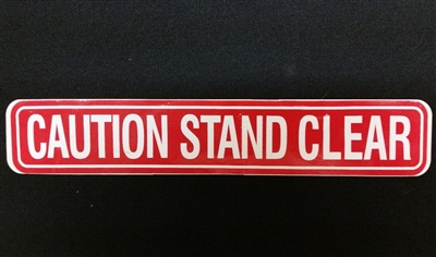 C-00077 - "Caution Stand Clear" - â€‹1 5/8"H x 9"W - (One Sided) - â€‹ANSI 156.10 COMPLIANT - (NABCO)
