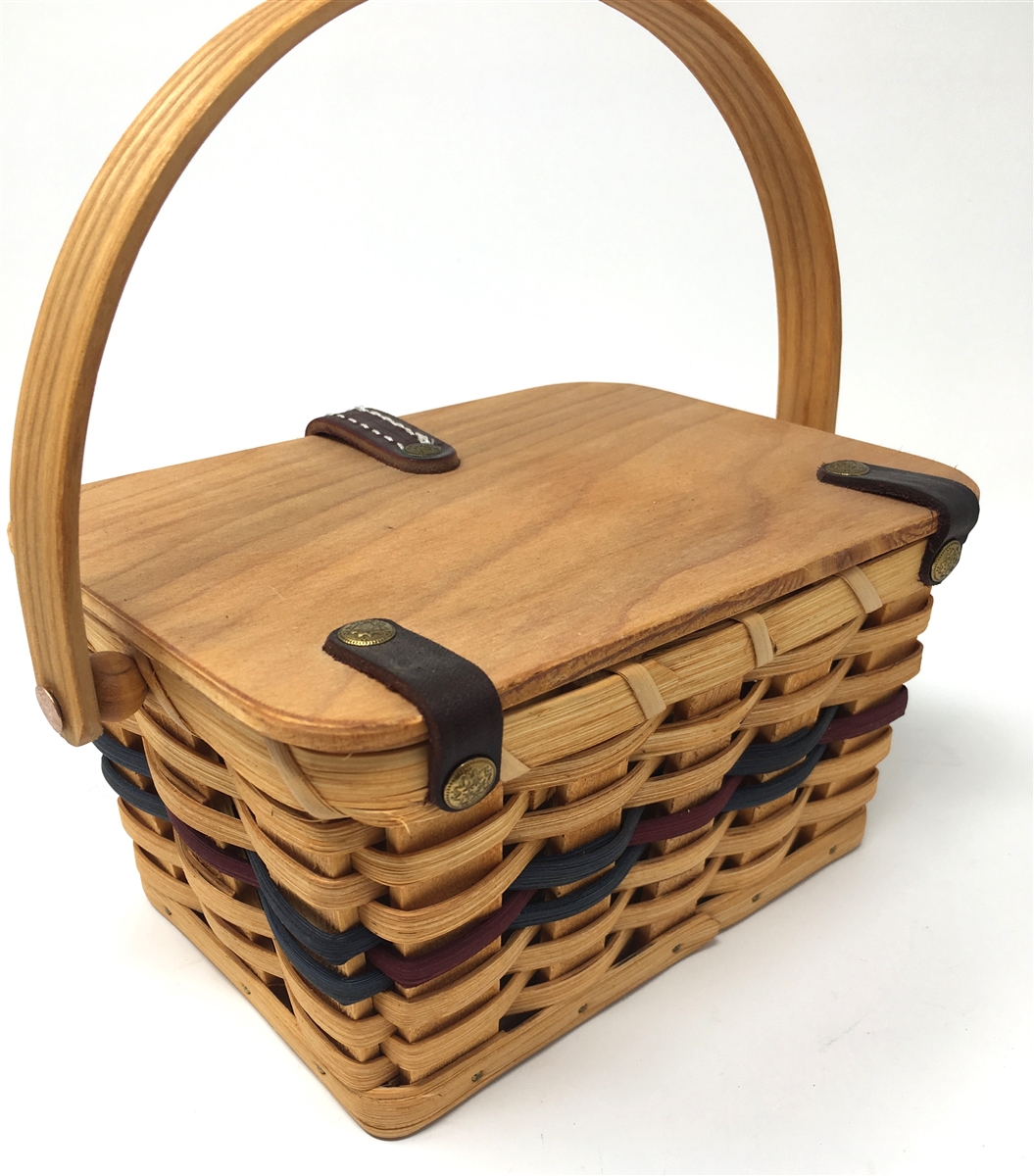 Amish handmade and perfectly constructed. Features a beautifully stained  lid with a snap to hold the purse close. This basket is made by Sam & Emma  who are from Swartzenberger Baskets with