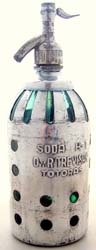 Rare Metal Gajos Vintage Seltzer Bottle | The Seltzer Shop | Colored Argentine seltzer bottle - vintage seltzer pendant light - wine chiller interior design elements