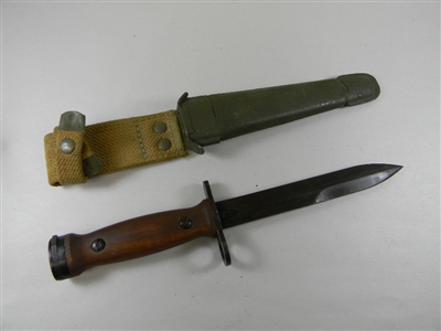 EARLY ITALIAN CARBINE BAYONET WITH WOOD HANDLE AND LEATHER SCABBARD.