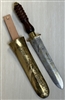 DIVERS KNIFE WITH WOOD HANDLE AND BRASS SHEET.