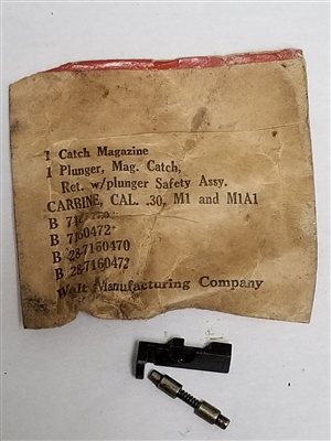 M1 CARBINE US GI MAGAZINE CATCH SET IN ORIGINAL PACKAGE.