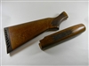 ORIGINAL FACTORY MOSSBERG 500 WOOD STOCK SET WITH LATE RUBBERIZED BUT PLATE.