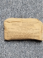 BRITISH WWII FIRST AID SHELL DRESSING.