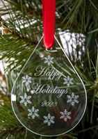 The 2023 - Happy Holidays - Raindrop-shaped AA Holiday Ornament featuring 9 unique snowflakes with a circle-triangle style (Alcoholics Anonymous) AA logo at the center of each flake.