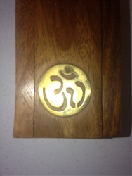 Traditional Wooden Stick Incense Burner with a brass inlay of the symbol OM