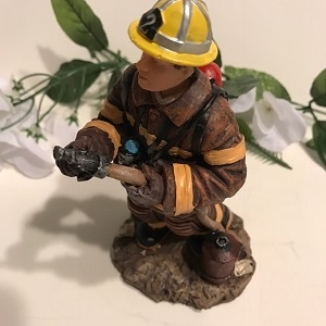 Small Fireman with hose