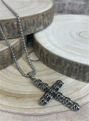 stainless steel skull cross pendant on a stainless steel chain