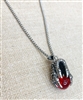 stainless steel claw pendant on a stainless steel chain