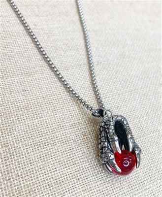 stainless steel claw pendant on a stainless steel chain