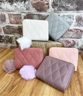 quilted pom pom purse