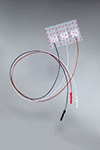 3M RED DOT Neonatal ECG Electrodes, Pre-Attached Wire, 2cm x 4cm, Radiolucent, Clear Tape. MFID: 2269T
