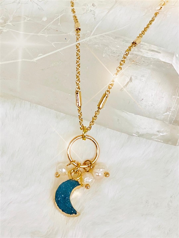 Crescent Moon necklace on white background