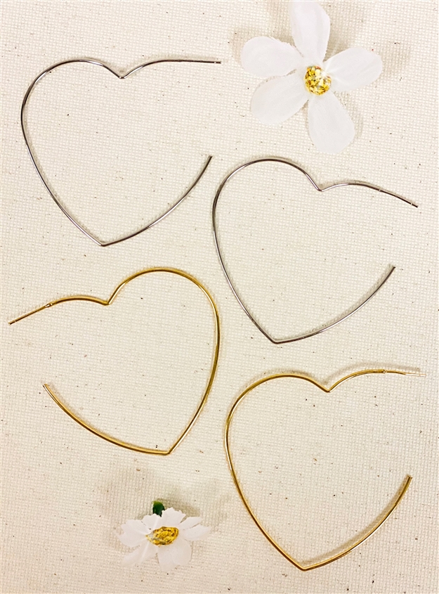 heart hoop earring on white background