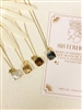 Four different Mirajo jewelry Sisterhood necklaces on light background