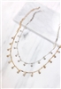 Two different Mirajo Jewelry waves choker necklaces on white background