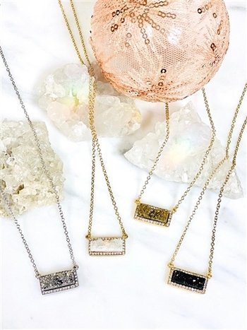 Four different Mirajo Jewelry you are my rock druzy bar necklace on white background