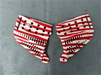 A set of JT Proflex Ears. The ears are white with red stripes.