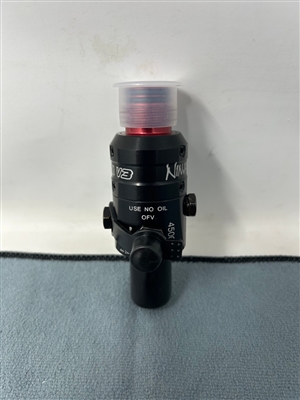 A Ninja Pro V3 4500psi tank regulator with red aluminum bonnet. The reg has an SHP output pressure.
