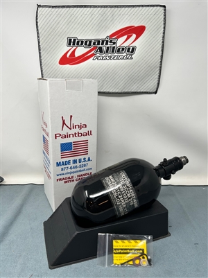 A Ninja SL2 68/4500 carbon fiber HPA tank. The tank is gloss black and has a gold logo. The tank is equipped with a Pro V3 regulator with a stainless steel bonnet.