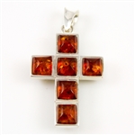 This is a two sided amber cross.  Green one one side and honey colored on the reverse.