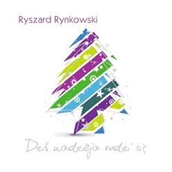 Koledy Sung By Ryszard Rynkowski.  Rynkowski does contemporary music in a soft rock format. He sings carols in a style that could be characterized as easy listening.