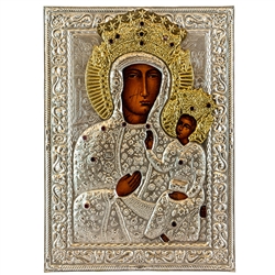 Made in Poland this icon is hand painted and covered with a beautiful cover of zinc plated copper featuring fine bas-relief. This picture is studded with red faux gems.