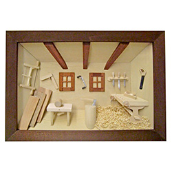 Poland has a long history of craftsmen working with wood in southern Poland. Their workshops produce beautiful hand made boxes, plates and carvings.  This shadow box is a look inside a traditional Polish carpenter's shop