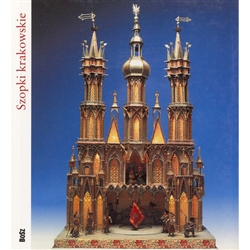 This beautiful Polish language mini album was published to commemorate the 2004 Cracovian Christmas Creche Competition and features 63 pages of full color photos of a beautiful variety of cribs. The back page features a group photo of many of the creche m