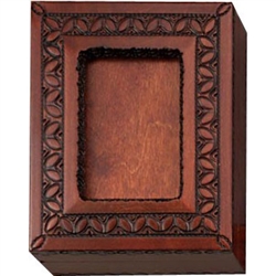 An absolutely beautiful box!  Walnut stained box with detailed picture frame on the beveled top. Frame has a opening on one side to slide in a photo, but this box is just as beautiful as is. Made for wallet size photos: 2 3/8 x 3 3/8.Box also opens to a r