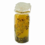 This beautiful amber colored candle has real raw amber pieces imbedded inside the wall of the candle and an amber "tree" of polished stones decorating the outside. Made from the highest quality paraffin with an addition of bees wax guarantee a clean and l