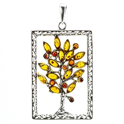 Art nouveau tree motif pendant. Casting work sets off the lovely honey and cherry colored stones on branches of sterling silver! A modern amulet of life!