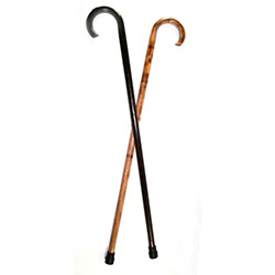 Sturdy wooden cane (walking stick) with carved ring designs.  Heavy duty rubber tips at the end.  Available in dark finish only.