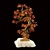 The leaves of this bonsai style tree are made with real polished amber stones attached to branches and trunk of twisted brass wire. The tree sits atop a piece of the finest Polish marble called "Marianna". Brass tags are in Polish.