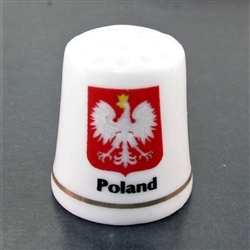 This porcelain thimble has the Polish eagle against a red background. Beautiful collector's item. Poland on one side and Polska on the reverse.