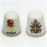 This porcelain thimble features Pope John Paul II on the front and the papal insignia on the reverse.  Beautiful collector's item.