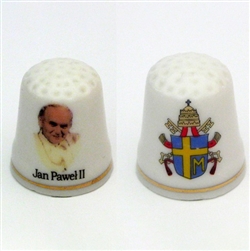 This porcelain thimble features Pope John Paul II on the front and the papal insignia on the reverse.  Beautiful collector's item.
