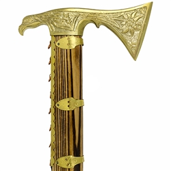 The ciupaga is the Polish mountaineer's combination mountain axe and walking stick. This model has a beautiful solid brass head. Made in Zakopane the main body has a stripe pattern Sometimes vertical and sometimes horizontal) in the wood grain.