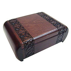 This beautiful box is made of seasoned Linden wood, from the Tatra Mountain region of Poland.  This unique secret-opening box has a dual geometric-design bands on the lid and red-felt lining inside.