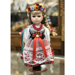With Porcelain head, arms & legs, and hand made authentic dress, this is a beautiful doll!  Costume is hand made so details will vary from doll to doll.