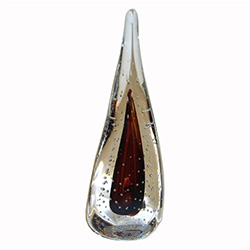 Four-sided art glass paperweight, with a dark amber interior core, surrounded by miniature bubbles, in a classic teardrop shape.  Each piece is hand blown and hand finished in Poland.  Made with the highest quality craftsmanship and hand-signed by the art