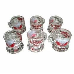 Set of (6) clear shot glasses, emblazoned on one side with the Polish eagle against a red & white banner, and the famous saying: "Na Zdrowie - Cheers!" on the other side.