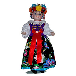 With porcelain head, arms & legs, and hand made authentic Slask (Silesian) dress, this is a beautiful doll! Please note that dress materials are unique and vary from doll to doll so no two are exactly alike. Stand included.