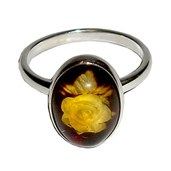 Unique and lovely honey amber rose blossom set in sterling silver ring!  The exquisitely detailed rose design is hand-carved from the reverse side of the amber.