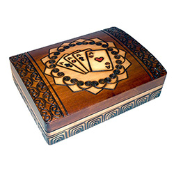 This double card box has two compartments, side by side, to hold two standard decks of playing cards. A card design featuring the Ace of each suite decorates the lid.
