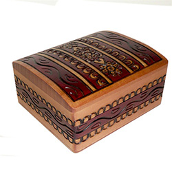 Curved-top box. treasure-chest style, with a hand painted and burned design.