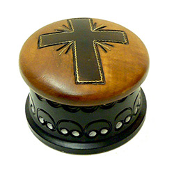 Round hand-painted box with a cross on the lid.