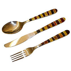 Very elegant sterling-silver knife, fork and spoon set, with the handles decorated with bands of cream, cherry, honey and green amber.  Amber craftsmanship is from Lithuania and the stainless steel utensils are from Brazil.